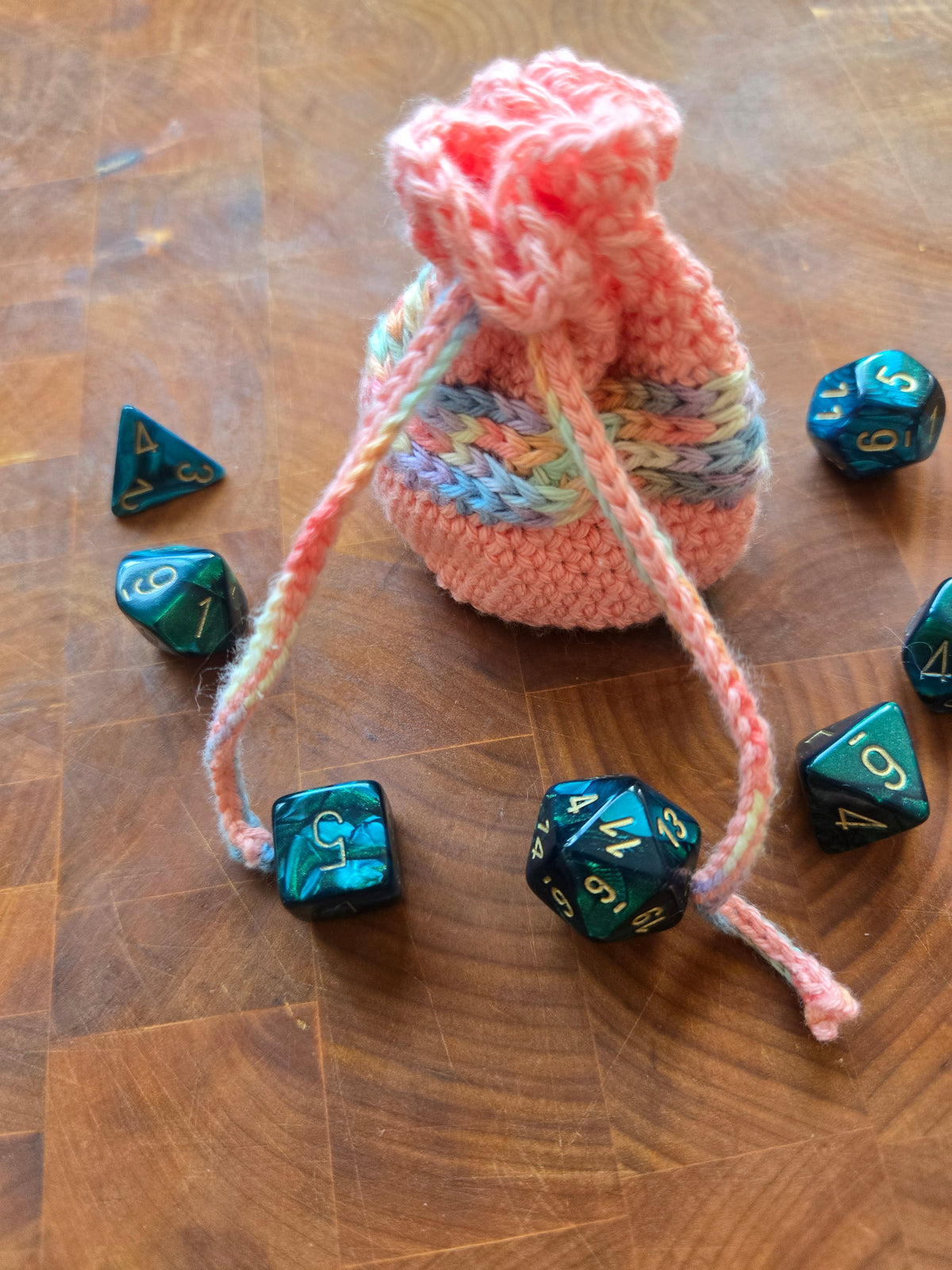 Peach and rainbow 7 die dice bag