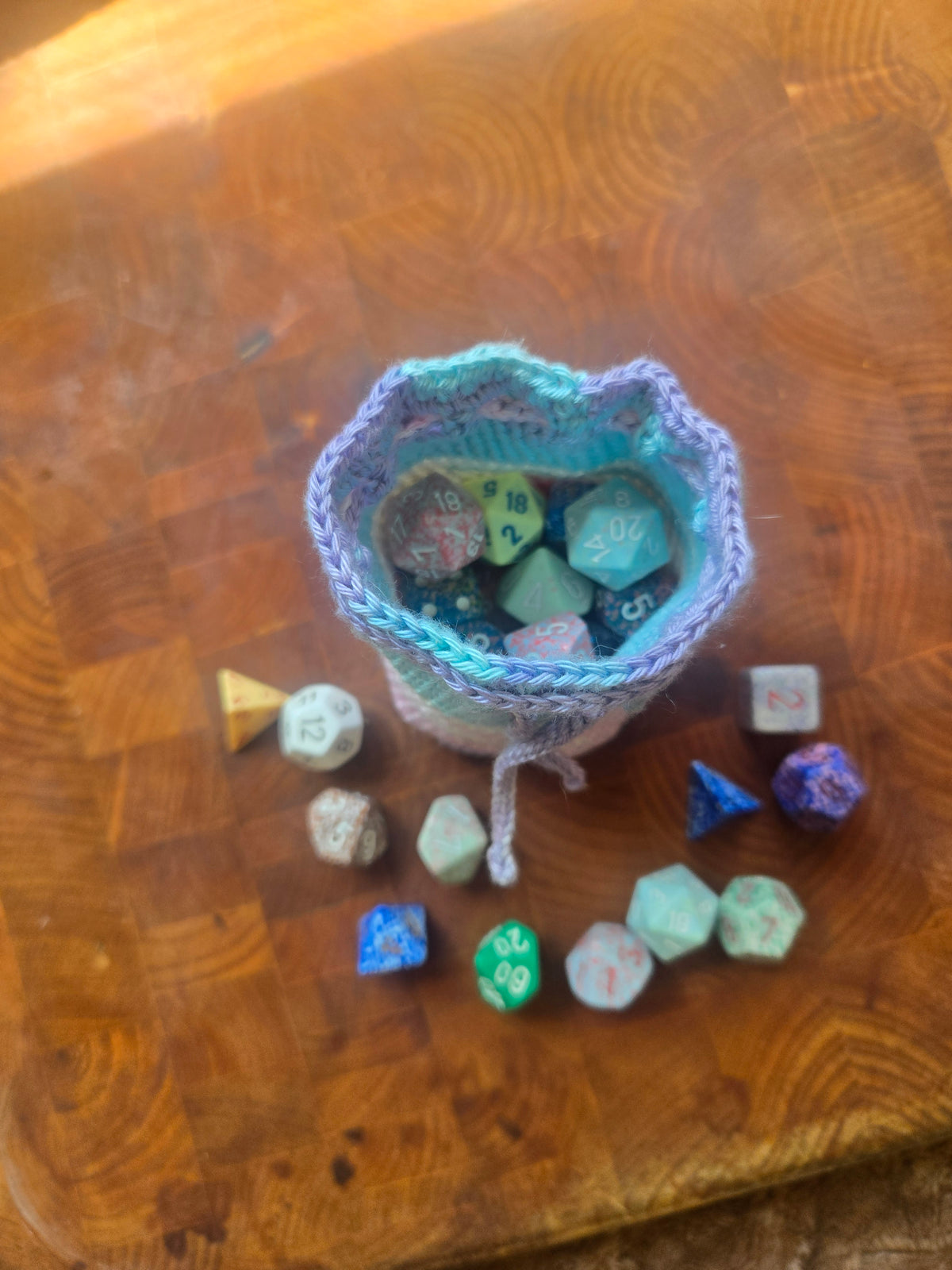 White, pink, cyan and purple large dice bag!