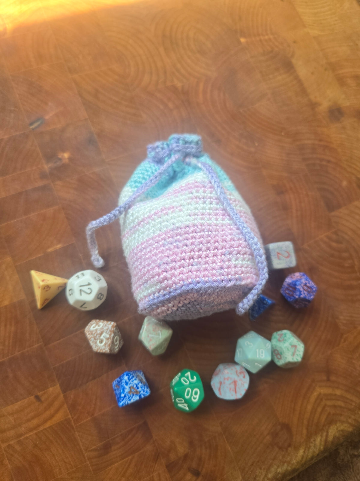 White, pink, cyan and purple large dice bag!